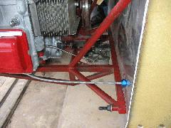 Lower left of firewall showing throttle cable and bulkhead connector IMG_0390.jpg